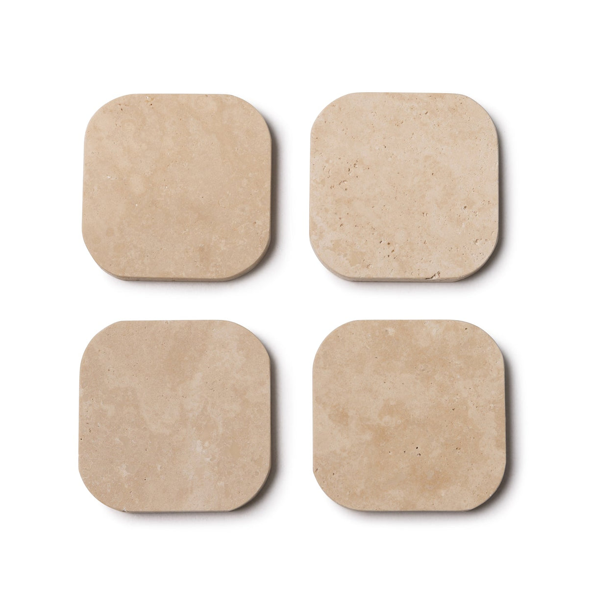 TRAVERTINE ONDERZETTERS 4 STUKS