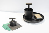 CARRY AWAY PAPERWEIGHT BLACK